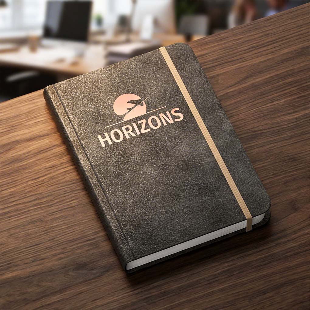 Custom leather notebook with company logo printing and elastic closure for corporate gifts in Dubai