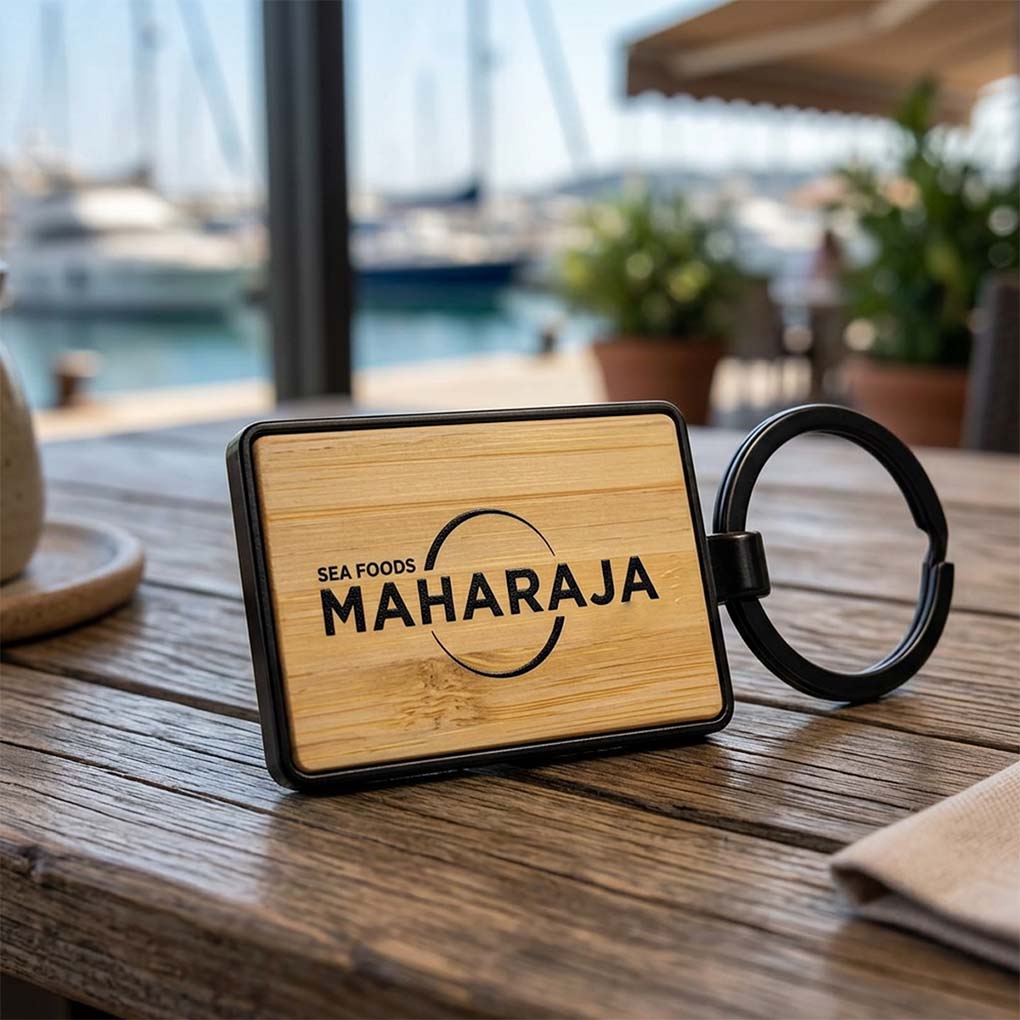 Custom wooden keychain printing in Dubai with business logo for restaurants and corporate gifts