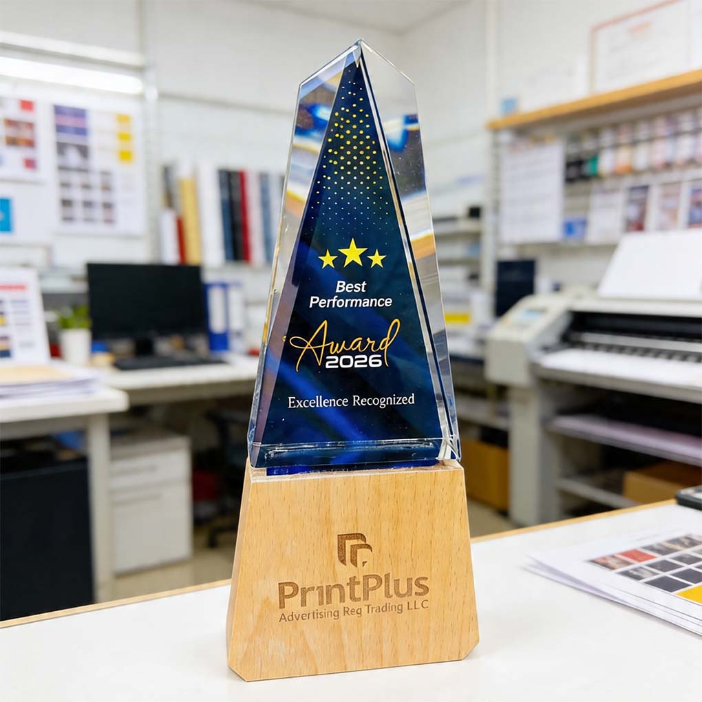 Custom crystal trophy award with engraved wooden base for corporate recognition in Dubai